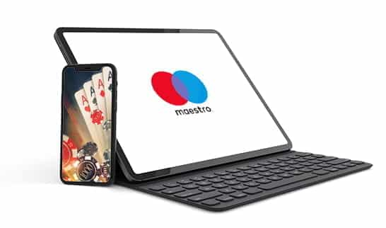 Uno smartphone con il logo di Maestro connesso ad un sito di casinò