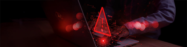 Laptop e segnale di allarme