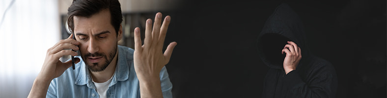 Utente che parla al telefono con un uomo incappucciato, per rappresentare la truffa del vishing
