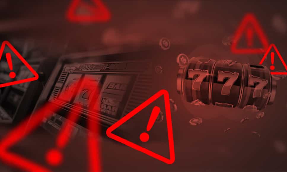 Slot machine e simobolo Attenzione