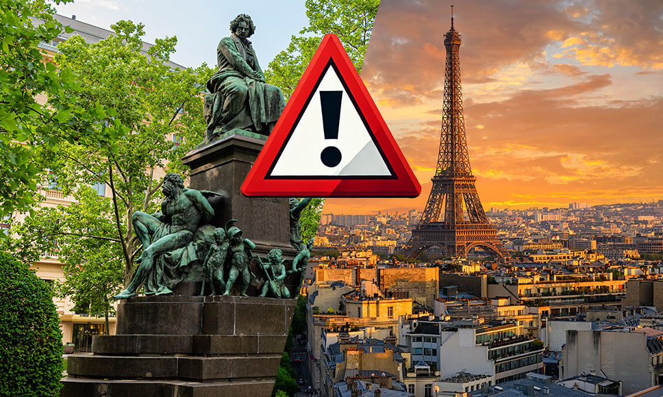 Monumenti Parigi e Vienna con segnale di pericolo