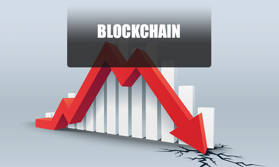 Grafico in discesa, scritta Blockchain