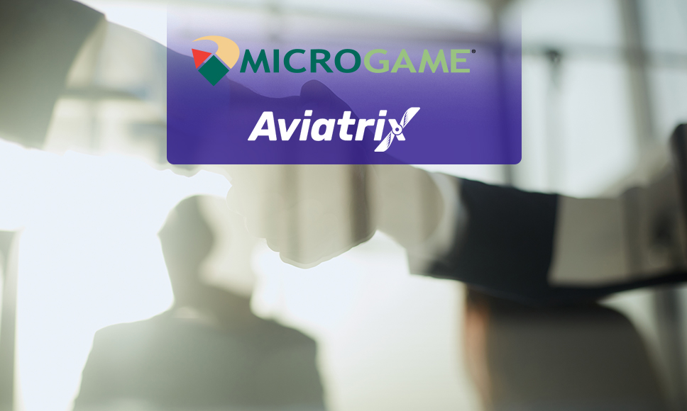 Logo Microgame e logo Aviatrix con sfondo di simbolica stretta di mano.